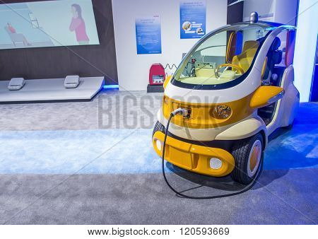 LAS VEGAS - JAN 08 : Electric car at the Denso booth at the CES Show in Las Vegas Navada on January 08 2016. CES is the world's leading consumer-electronics show.