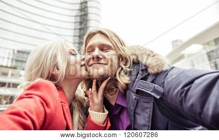 Young Couple Spending Time In The Afternoon In Milan City Center And Taking Selfies