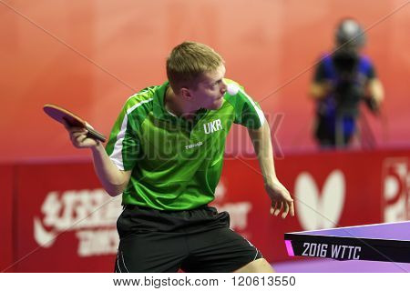 KUALA LUMPUR, MALAYSIA - MARCH 01, 2016: Yevhen Pryshchepa of Ukraine plays return shot in his match in the Perfect 2016 World Team Table-tennis Championships held in Kuala Lumpur, Malaysia.