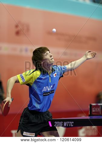 KUALA LUMPUR, MALAYSIA - MARCH 01, 2016: Kenta Matsudiara of Japan tosses the ball to serve in his match in the Perfect 2016 World Team Table-tennis Championships held in Kuala Lumpur, Malaysia.
