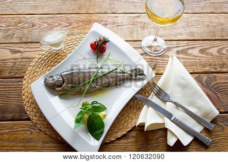 the  boiled rainbow trout with fresh vegetables