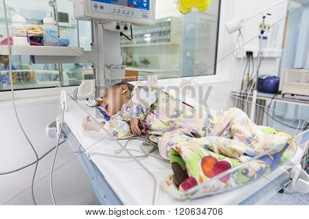 Baby In Clinic Bed