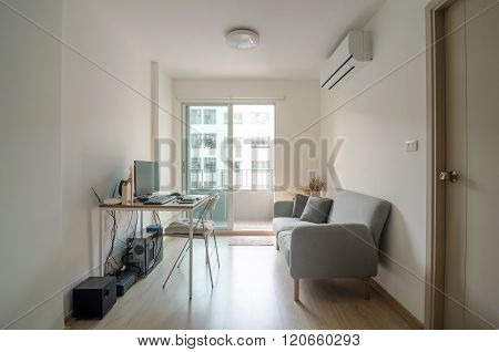 Living Room With Working Area In Apartment