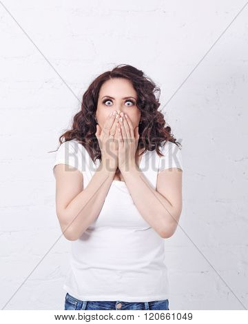 Girl Was Scared And Closed Her Mouth With Her Hands.