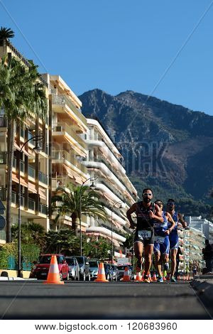 Runners Race On Paved Roads