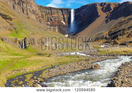 The Hengifoss waterfall in Iceland in the distance