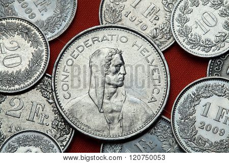 Coins of Switzerland. Alpine herdsmen depicted in the Swiss five franc coin.