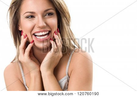 Beautiful young woman laughing and showing her perfect white teeth 