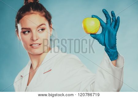 Scientist Doctor With Rotten Apple. Gm Food.