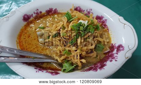 spicy Chinese noddle with chicken leg soup