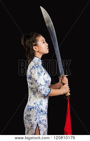 asian woman with japanese sword, Black background