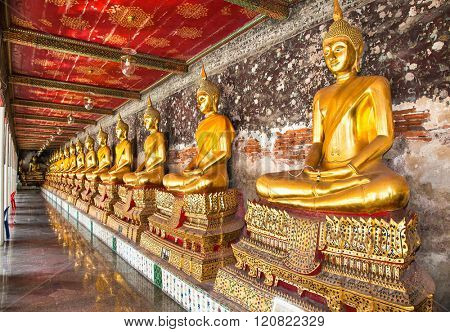 Bangkok, Thailand- Jan 20, 2016:Rows of Buddha Images around  Wat Suthat Thep Wararam Buddhist temple on Jan 7,2016 in Bangkok, Thailand.
