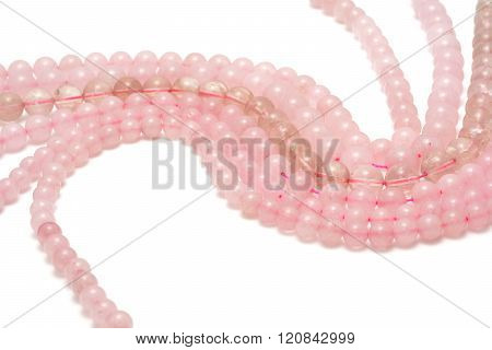 Strings of pink quartz