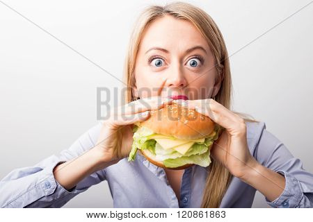 Woman eating burger