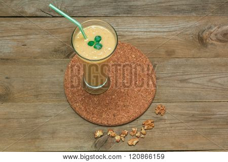 Fruit Smoothie With A Straw On A Stand