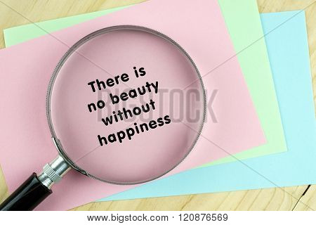 Magnifying glass on papers with inspirational words