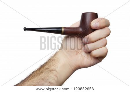 Male hand holding a smoking pipe