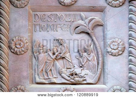 PISA, ITALY - JUNE 06, 2015: Detail of the San Ranieri gate of the Cathedral St. Mary of the Assumption in Pisa, Italy on June 06, 2015
