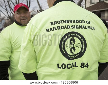 MAR 5, 2016 - WOODBRIDGE, NJ: NJ Transit rail workers wearing Brotherhood of Railroad Signalmen, Local 84 tshirts show support of the rail labor unions at the rally a week before the strike deadline.