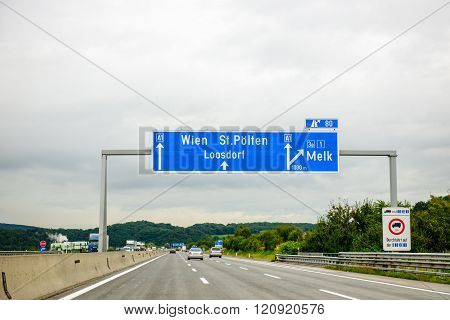 AUSTRIA - SEP 18 2013: Austrian Federal Motorway highway direction sign - direction sign to Wien St Polten loosdorf Melk. Useful file for your flyer about European and German road infrastructure and other needs