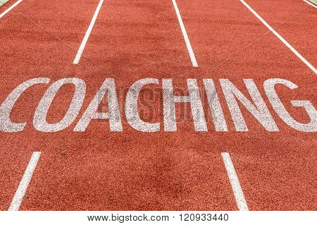 Coaching written on running track