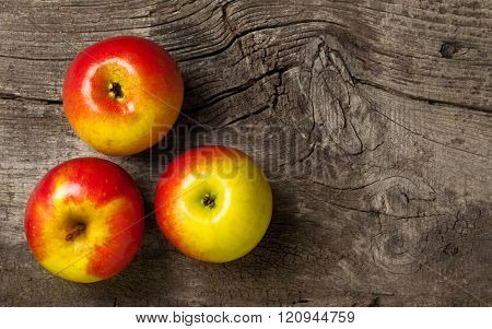 Ripe Red Apples On An Old Wooden Gray Background