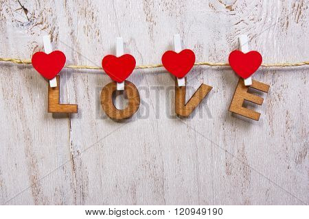 Wood Letters And Heart Forming Word Love