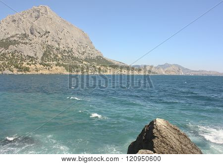 Sea Mountains In The Background