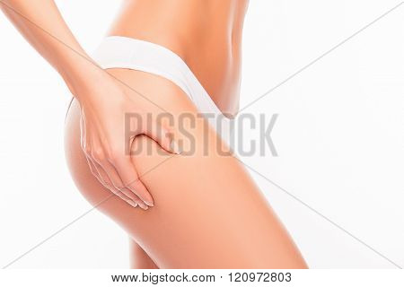Closeup Photo Of Young Woman Making An Anticellulitis Massage For Her Hip