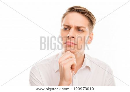 Portrait Of Serious Minded Man Touhing His Chin