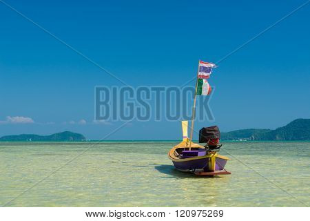 Traditional thai longtail boat at famous sunny Long Beach, Thailand, Koh Phi Phi Don, Krabi province, Andaman sea