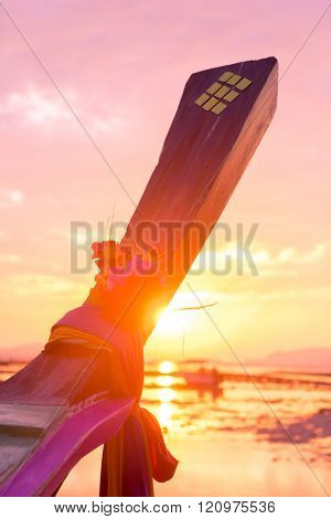 Long tail fishing boats at sunet in Thailand