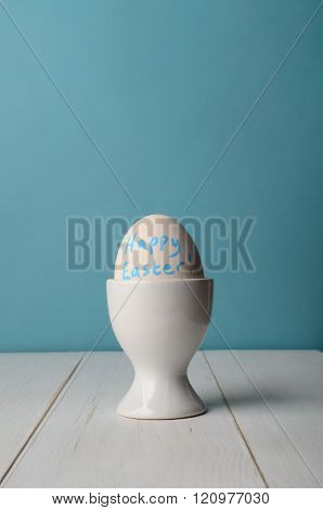 Happy Easter Message On Egg In Egg Cup