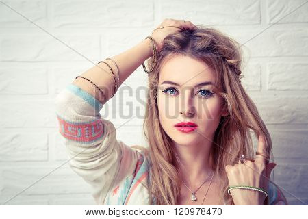Boho Girl Portrait at White Brick Wall Background