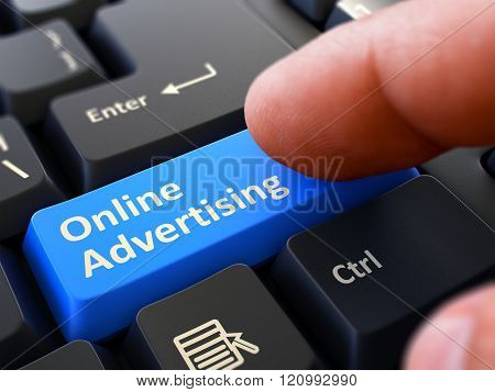 Press Button Online Advertising on Black Keyboard.