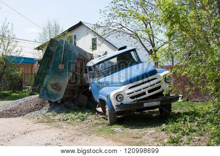 A Truck With A Load Fell Down