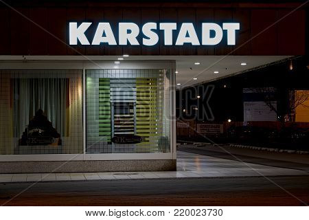 MAGDEBURG, GERMANY - DECEMBER 25, 2017: Exterior view of a Karstadt store in Magdeburg at night. The first Karstadt department store opened in 1881