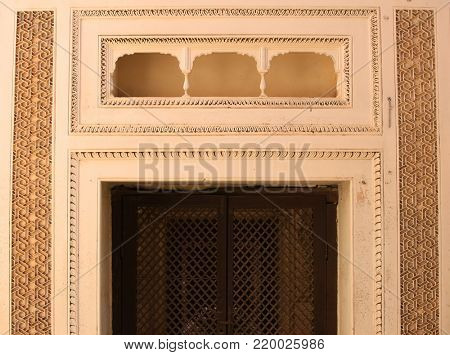 Intricate design on the walls Paigah tombs in Hyderabad, India