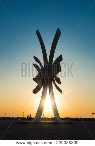 Costinesti, Romania - 30 August, 2017: Beautiful background with amazing sunset over the artistic Obelisc monument in summer holiday