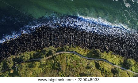 Aerial view over Burleigh Headland shoreline and lower walking track
