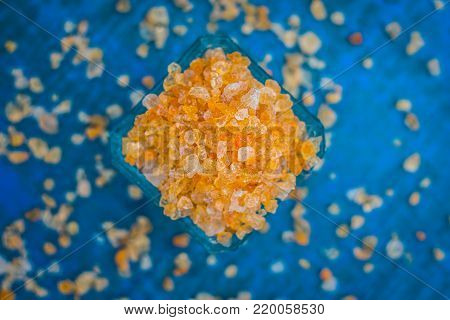 Close Up Of Edible Gum,gond,acacia Gum In A Blue Colored Bowl.