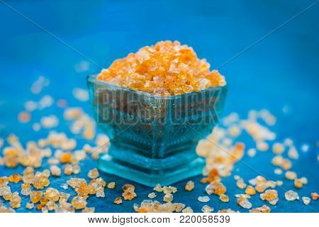 Close Up Of Edible Gum,gond,acacia Gum In A Blue Colored Bowl.