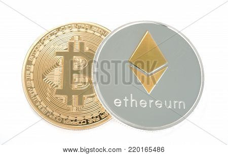 Real coin of cryptocurrency Silver Ethereum and golden bitcoinisolated on white background