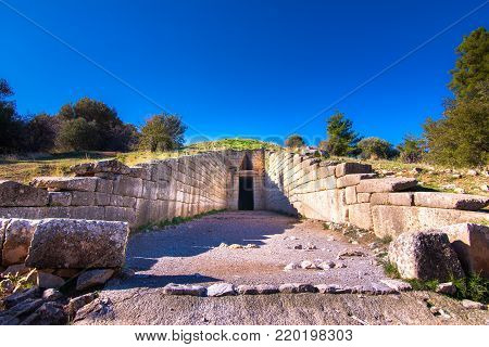 The archaeological site of Mycenae near the village of Mykines, with ancient tombs, giant walls and the famous lions gate,  Peloponnese, Greece