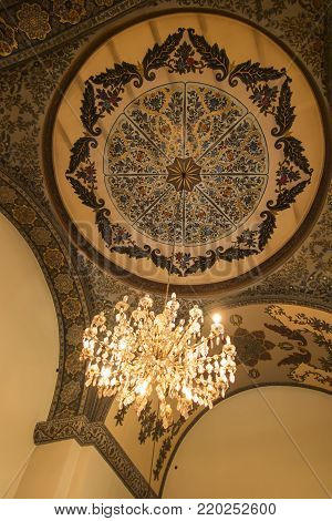 VAGHARSHAPAT, ARMENIA - SEPTEMBER 17, 2017: The decor of the main entrance to Etchmiadzin Mother Cathedral, includes gilt relief Byzantine patterns