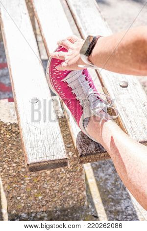 Female Doing A Hamstring Stretch