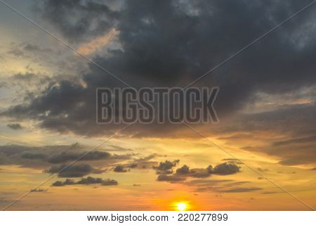 Beautiful Colorful Sunset With Dramatic Clouds And Sun Shining