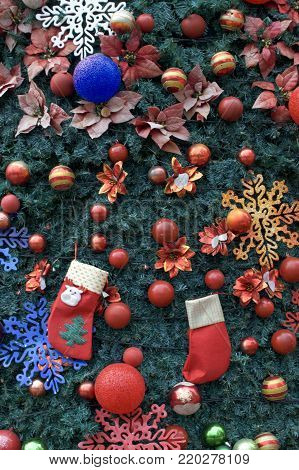 Colorful Christmas tree decoration close up background outdoor