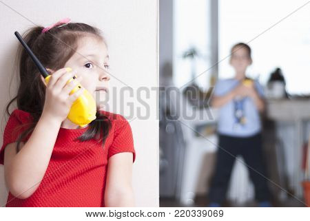 Children Play With Walkie-talkie