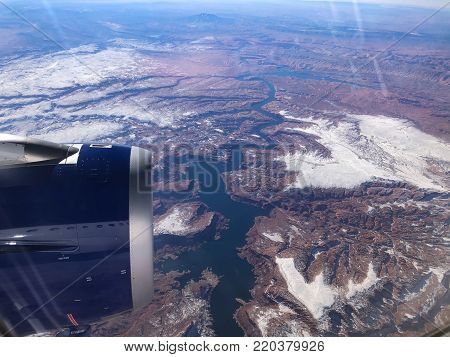 Aerial View Of The Desert And Snow-capped Mountains In Colorado